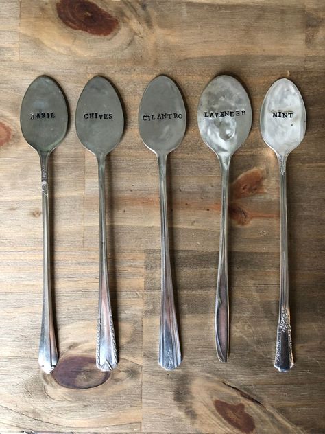 Stamped spoon plant markers made with vintage silver plated iced tea spoons. These markers are all hand stamped and all one of a kind. Select from the drop down variation menu to select which herb variety you would like your plant marker to say. This listing is for one (1) plant marker only, no plant included. Varieties include basil, chives, cilantro, lavender, mint, oregano, parsley, rosemary, sage, and thyme. If you would like a different herb variety, feel free to send a custom order request Metal Spoon Crafts Diy, Spoon Plant Markers, Spoon Garden Markers, Spoons Diy, Garden Plant Markers, Silverware Crafts, Rosemary Sage, Herb Markers, Map Ornaments