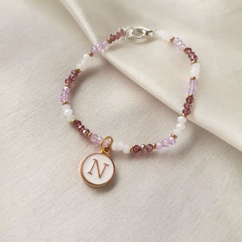 Personalized just for you. 🪻🤍 Customised Bracelet with Initial - 💬 . . . . . . . #customised #bracelet #initials #braceletoftheday #wristwear #crystaljewelry #jewelry #handmadejewelry #purpleaesthetics Customised Bracelets, Wrist Wear, Crystal Jewelry, Initials, Handmade Jewelry, Bracelet, Beads, Purple, Quick Saves