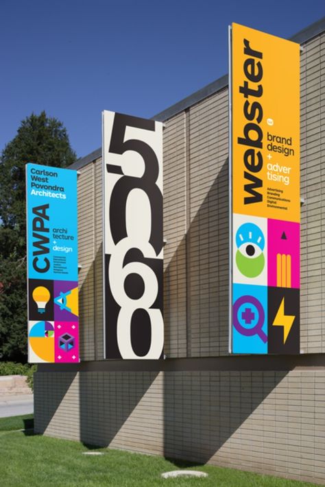 Webster/CWPA Building Banners - Graphis Ceiling Banner Design, Flag Banner Design, Wall Banner Design, Signage Design Outdoor, Building Banner, Banner Graphic Design, Welcome Sign Design, Pull Up Banner Design, Banner Signage