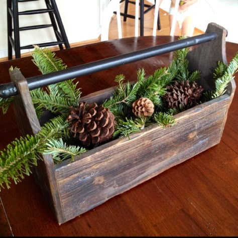 Evergreen in a wooden toolbox How To Decorate A Wooden Tool Caddy, Wooden Toolbox Decor, Wooden Toolbox Christmas Decor, Painted Toolbox Ideas, Wood Toolbox Decor Ideas, Vintage Wooden Toolbox Decorating Ideas, Wood Tool Box Decor, Wooden Toolbox Ideas, Toolbox Decor