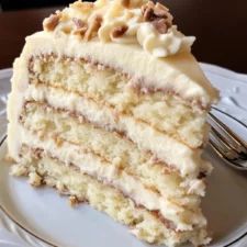 White German Chocolate Cake White Chocolate German Chocolate Cake, Snowy Bavarian Bliss Cake Recipe, White German Chocolate Cake Recipe, White German Chocolate Cake, German Buttercream Recipe, German Chocolate Cake Frosting, German Buttercream, Chocolate Filling For Cake, German Chocolate Cupcakes