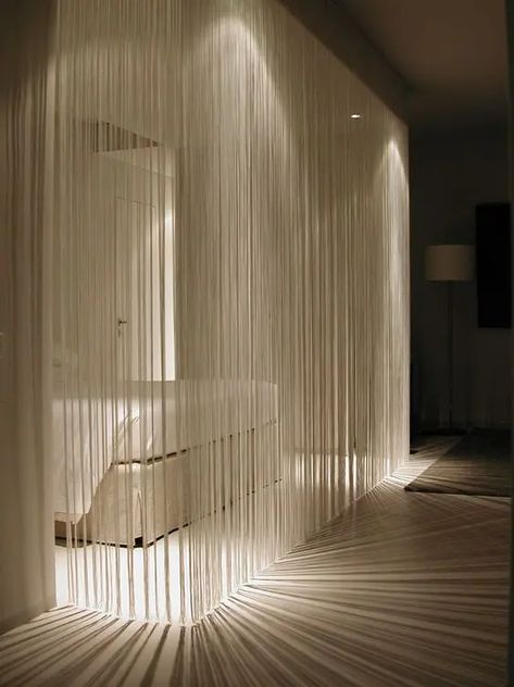 fringe curtains that are lit up are a perfect divider for modern and minimalist homes Bedroom Divider, Curtain Divider, Curtain Room Divider, String Curtains, Diy Room Divider, Curtain Fringe, Room Divider Curtain, Romantic Lighting, Trendy Bedroom