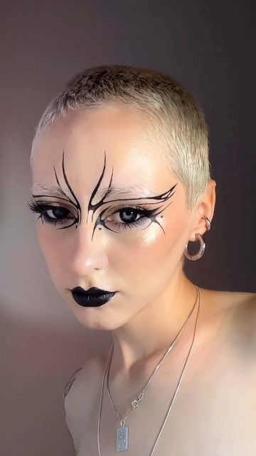 Graphic Face Art, Smokey Graphic Liner, How To Graphic Liner, Dark Liner Makeup, Metallic Graphic Liner, Goth Liner Makeup, Insect Inspired Makeup, Goth Butterfly Makeup, Cybergoth Eyeliner