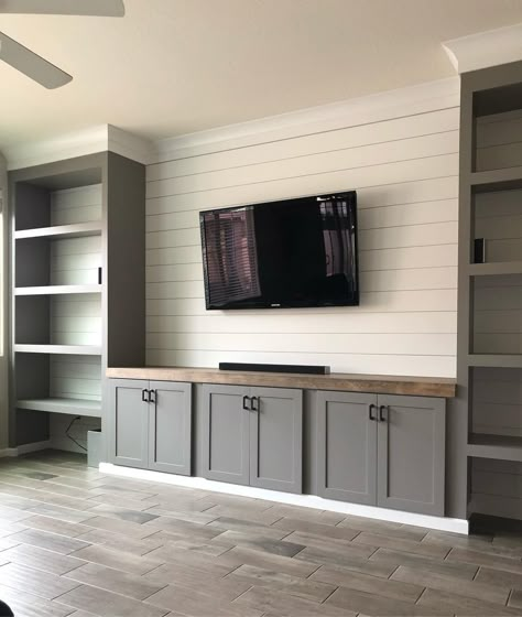 Wall Length Entertainment Center, Entertainment Feature Wall, Finished Basement Tv Wall, Diy Tv Wall Built Ins, Family Room Entertainment Wall, Wall To Wall Cabinets Living Room, Built In Wall Living Room, Tv Wall Modern Farmhouse, Built In Basement Entertainment Center