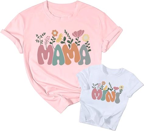 PRICES MAY VARY. ★★Material: This cute wildflowers mommy and me matching shirts are made of Cotton Blend, super soft and comfortable to wear. ★★Features: Mom and Baby Matching Outfits T-Shirts, Mama Mini Floral Graphic Tshirts for Women and Toddler Girls, Funny Letter Print T-Shirt for Mother and Daughter, Retro Wildflowers Graphic Tee, Casual Summer Short Sleeve T-Shirt, Mother's Day Gift Shirts. ★★Occasions: Funny Mom and Me Family Matching Outfits are prefer for Spring, Summer, Fall, Winter, Mom And Baby Matching Outfits, Mother And Daughter Outfits, Mini Tees, Baby Matching Outfits, Mini Shirts, Daughter Outfits, Beach Play, Funny Letters, T Shirt Painting