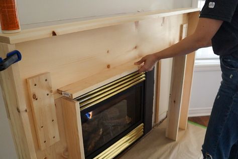 A Surprisingly Easy DIY Fireplace Mantle - HGTV Canada Build Your Own Fireplace Surround, Making A Fireplace Mantle, Diy Fireplace Hearth Ideas, Diy Fake Fireplace Mantle, Diy Wood Fireplace Surround, Fireplace Without Mantle, Simple Fireplace Mantel, Easy Diy Fireplace, Fireplace Surround Diy