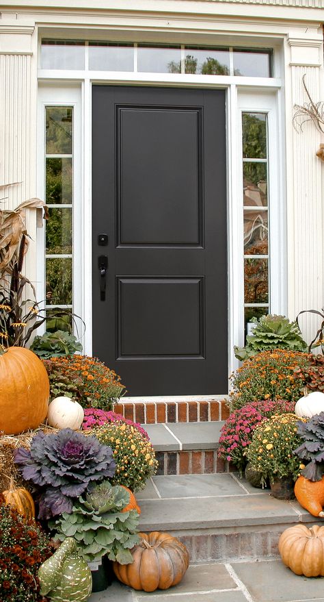 black 2 panel front door from masonite holiday inspired 2 Panel Front Door, Black Front Door With Sidelights, Panel Front Door, Sophisticated Farmhouse, Front Door With Sidelights, Door With Sidelights, Fiberglass Exterior Doors, Winter Door Decorations, Foyer Ideas