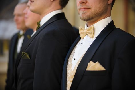 Gold groomsmen attire with gold bowtie, classy and stylish. Black And Gold Wedding Bridal Party, Gold Groomsmen Suits, Gold Groomsmen Attire, White Jeans For Men, Mendoza Wedding, White Tuxedo Wedding, Grooms Suits, Gold Bowtie, Grey Tux