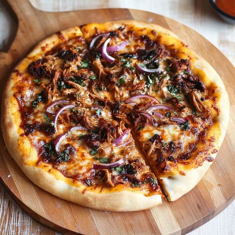 BBQ Pulled Pork Pizza Recipe - emiliarecipes.com Brisket Pizza, Pulled Pork Pizza Recipe, Pork Pizza, Pulled Pork Pizza, Crispy Pizza Crust, Tangy Bbq Sauce, Bbq Pizza, Classic Pizza, Mushroom And Onions