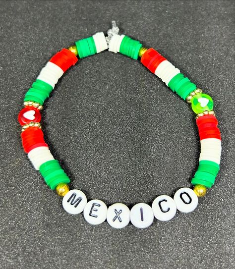 Mexico 🇲�🇽 (Country) Heishi Bracelet #handmadebracelet #heishibracelets #beadedbracelets #bracelets #mexico #mexicocity #mexico🇲🇽 #mexciolife #mexicobracelet #mexicojewelry #mexicobracelets Mexican Bracelets Handmade Beads, Mexico Bracelets, Mexico Beaded Bracelets, Red Mexican Bracelet, Mexican Protection Bracelet, Mexico Country, Friendship Bracelets With Beads, Clay Bracelet, Bracelet Designs