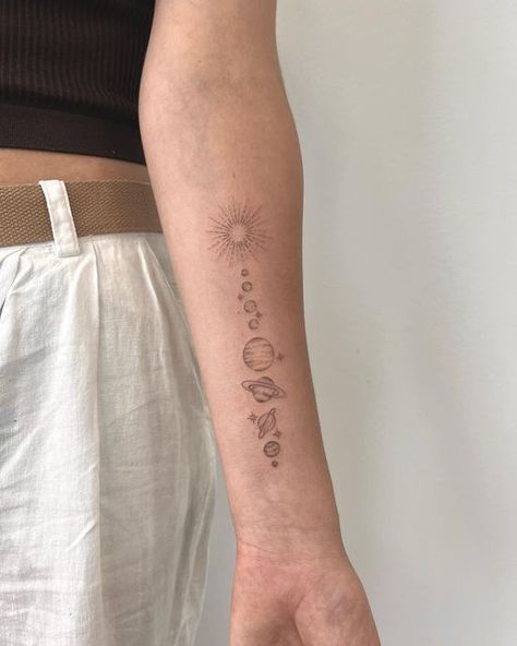 Spine Tattoos Solar System, Planet Tattoo Ideas Female, Solar System Tattoos For Women, Planet System Tattoo, Mini Solar System Tattoo, Simple Astronomy Tattoo, In Every Universe Tattoo, Tiny Solar System Tattoo, Cool Tattoos For Women Simple