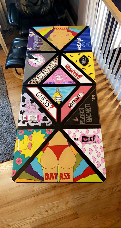 Painted beer pong table Custom Beer Pong Tables Diy, Beer Pong Painted Table, Ping Table Painted College, Funny Beer Pong Table Designs, Frat Beer Pong Table, Beer Ping Pong Table Painted, Diy Beer Pong Table Paint Ideas For Guys, Diy Pong Table Painted, Ping Table Ideas