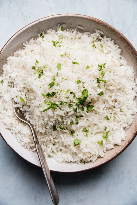 Why make plain white rice when you could make coconut rice? Fluffy and just barely sweet, it’s 100% next-level. Basmati Rice Recipes, Coconut Rice Recipe, White Rice Recipes, Cooking Basmati Rice, The Cookie Rookie, Cookie Rookie, Curry Spices, Lime Rice, Restaurant Dishes