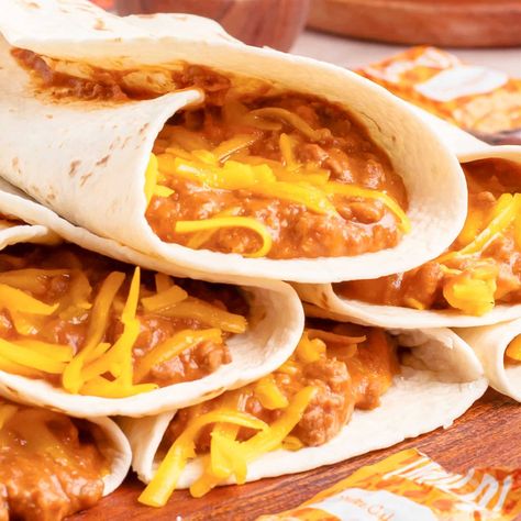 Taco Bell Chili Cheese Burrito Taco Bell Burrito Recipe, Chili Cheese Burrito Taco Bell, Chili Cheese Burrito, Smothered Beef Burritos, Taco Bell Copycat, Cheese Burrito, Canning Refried Beans, Cheese Taco, Chicken Enchilada Bake