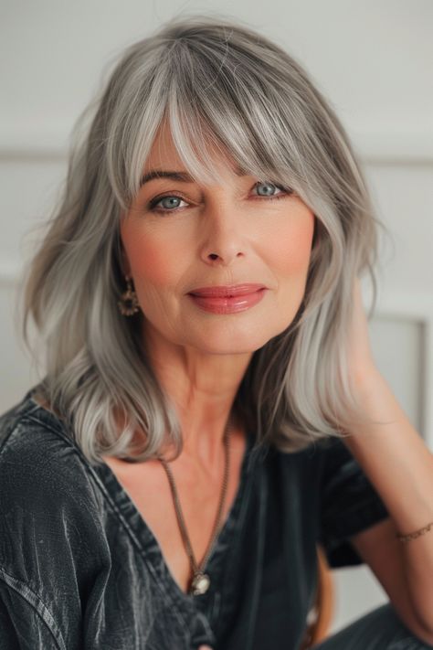 As women enter their 50s, they look for ways to update their style and feel confident and youthful. One of the best ways to transform your look after 50 is by getting bangs! The right fringe can… Mum Hair, Gray Bob, Grey Bob Hairstyles, Grey Bob, Bob Hairstyles With Bangs, Stylish Haircuts, Nails Makeup, Haircut For Older Women, Chic Hairstyles