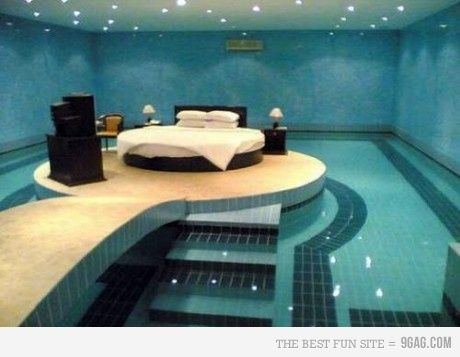 love this but I'd be afraid of falling off the bed lol Pool Bedroom, Ocean Bedroom, Indoor Swimming Pool Design, Water Bed, Round Beds, Pool Rooms, Indoor Swimming Pools, Modern Bedroom Design, Awesome Bedrooms