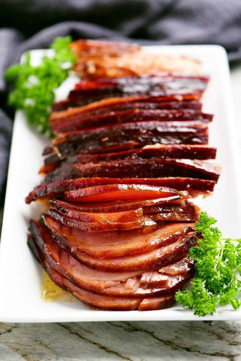 This Hot Honey Baked Ham recipe has a mouthwatering combo of sweet and spicy that's perfect for a holiday dinner or hot honey ham sandwiches! Hot Honey Ham Glaze, Hot Honey Glazed Ham, Honey Ham Sandwiches, Baked Ham Recipe, Spicy Ham, Honey Baked Ham Recipe, Ham Sauce, Hot Honey Recipe, Ham Recipes Baked