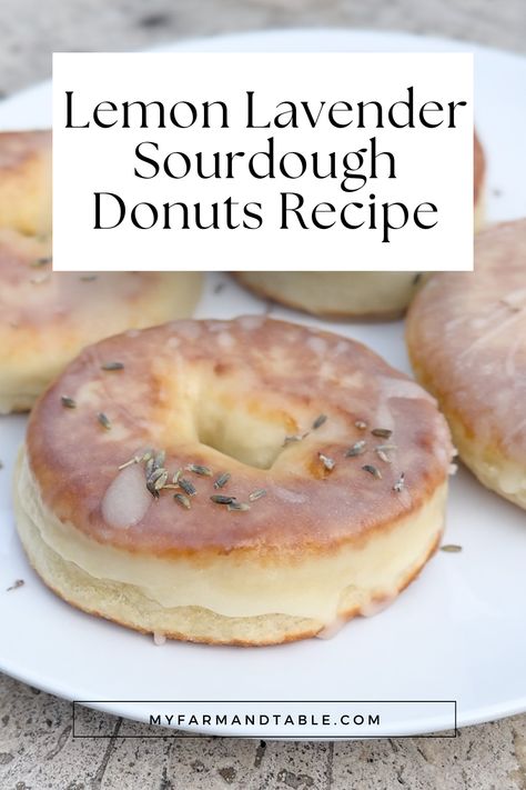 Indulge in our Lemon Lavender Sourdough Donuts Recipe! These delightful donuts combine the tangy flavor of sourdough with the refreshing taste of lemon and a hint of lavender. Perfect for breakfast or a sweet treat, these donuts are light, airy, and full of flavor. Our step-by-step guide ensures perfect results every time. Visit our blog for the full recipe and elevate your baking with these unique, flavorful donuts! Sourdough Lemon Recipes, Lavender Sourdough Bread, Lavender Sourdough, Sourdough Donuts Recipe, Lavender Bread, Lemon Sourdough, Sourdough Donut Recipe, Lavender Crown, Donuts At Home