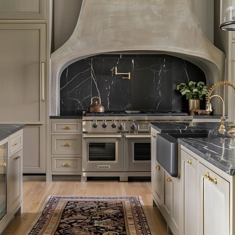 Kitchen of my dreams 💫 I love a bold statement in a kitchen, and recently that has been black marble for me! I love the contrast and warmth from the greige cabinets with the marble, and the brass hardware softens the space while remaining warm. This kitchen to me is timeless and one that will remain in style for years to come. AI Design: @oakhavendesignco . . . . . . . . . . . . #virtualdesign #virtualdesignservices #edesign #virtualhomedesign #moodboards #luxeathome #visionboards #prettyl... Lavender Kitchen Cabinets, Taupe And Black Kitchen, Stove Cove, Becki Owens Kitchen, Kitchens With Dark Cabinets, Greige Cabinets, Greige Kitchen Cabinets, Kitchen 2025, Lavender Kitchen