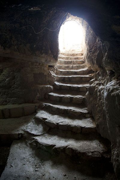 Picture of Looking up the stairs from within one of the many caves of St. hermes monastery in alqosh/Iraq. Such wonderful memories I have of countless visit to this wonderful site. Cave Stairs, Aesthetic Cave, Cave Architecture, Cave Aesthetic, Cave Photos, Stone Stairs, Cave In, Ten Commandments, Stairway To Heaven