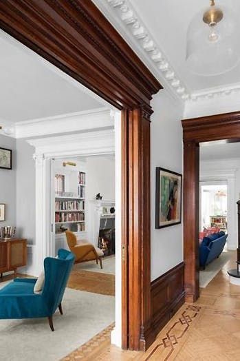 Emily Blunt and John Krasinski's Just-Listed Brooklyn Brownstone Is Legit the House of Our Dreams  via @PureWow John Krasinski And Emily, Modern Victorian Homes, Craftsman Interiors, Dark Wood Trim, Victorian House Interiors, Victorian Home Interior, Craftsman Interior, Brooklyn Brownstone, Victorian Interior