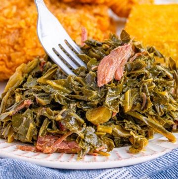 Southern Collard Greens Ham Hocks - Kitchen Divas Collard Greens Ham Hock Recipe, Collard Greens With Ham Hocks, Crockpot Collard Greens, Ham Shank, Southern Style Collard Greens, Ham Hock Recipes, Precooked Ham, Southern Collard Greens, Collard Greens Recipe