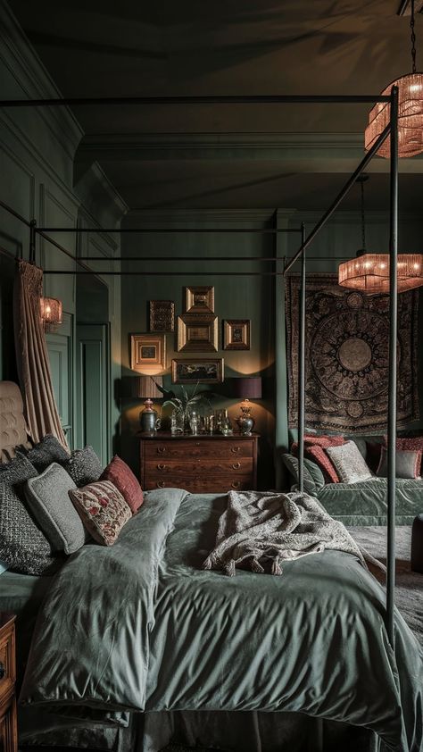 This dark sage green bedroom combines rich tones with bohemian textures for a dreamy Moody Canopy Bedroom, Green Black Gold Bedroom Ideas, Dark Moody Bedroom Aesthetic, Dark Grey Green Bedroom, Masterbedroom Bedroom Interior, Moody Gothic Bedroom, Phthalo Green Bedroom, Dark Moody Boho Bedroom, Dark Cosy Bedroom Ideas