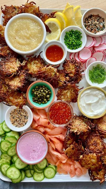 The Kitchn on Instagram: "Our Hanukkah plans? Making this latke board 😍😋 It’s a super fun and easy to celebrate the holiday that EVERYONE will love! Get @byrachelp’s latke tips and find out what’s not on her board at the link in bio! #thekitchn #hanukkah #latkes #latkeboard #latke #holidayhosting #holidayseason #holidayparty #holidayvibes" Hanukkah Dinner Party, Hannukah Dinner Ideas, Latke Board, Hanukkah Appetizers, Hanukkah Party Ideas, Chrismukkah Party, Hanukkah Party Food, Hanukkah Aesthetic, Chanukah Recipes