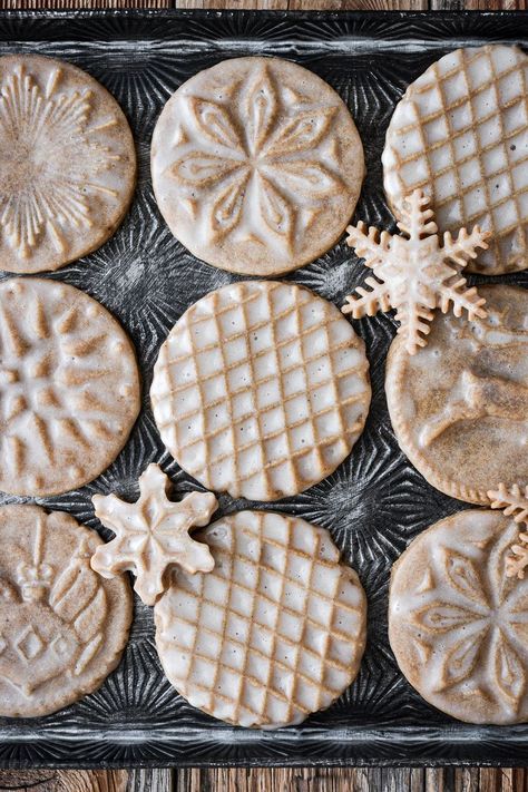 Soft gingerbread cookies pressed with cookie stamps and glazed with vanilla icing. These pretty stamped gingerbread cookies are the perfect thing to bake for Christmas. Icing For Gingerbread Cookies, Sugar Cookie Glaze, Thing To Bake, Cookies 2023, Gingerbread Icing, Icing Glaze, Soft Gingerbread, Cookie Glaze, Soft Gingerbread Cookies