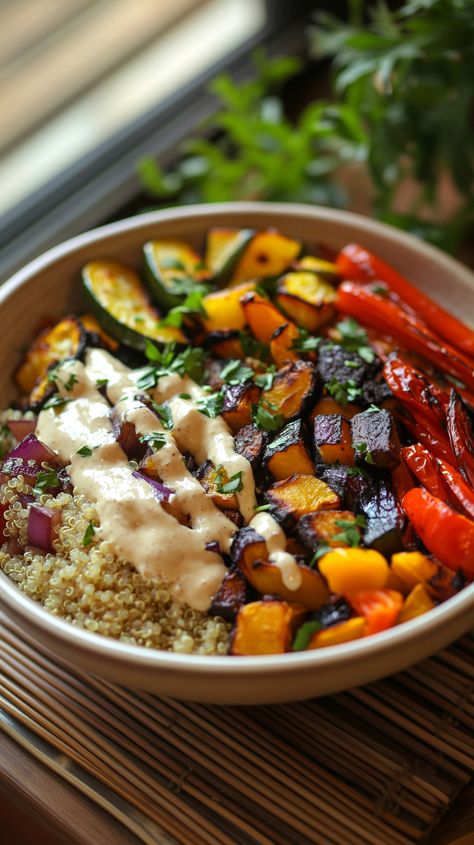 🌈 Dive into a world of flavors with this vibrant vegan Buddha bowl! 🍲 Featuring colorful roasted vegetables, fluffy quinoa, and a luscious drizzle of creamy tahini sauce, all beautifully arranged in a boho-style ceramic bowl. 🌿 Set on a bamboo mat with fresh herbs, this bowl radiates an organic charm. Let the natural light brighten your day as you indulge in this wholesome meal! ✨🥗 Carribean Bowl, Vegan Mediterranean Bowl, Bhudda Bowl, Buddha Bowl Sauce, Rice Bowls Healthy, Fluffy Quinoa, Health Soup, Power Bowl Recipe, Hummus Bowl