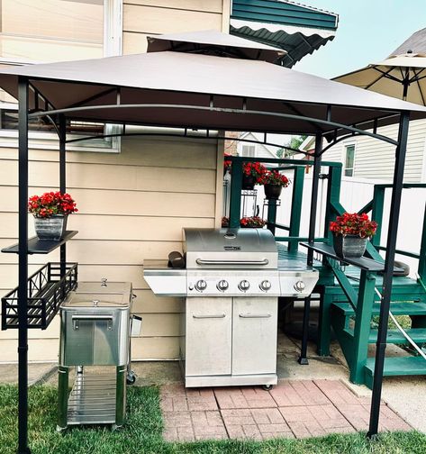 Outdoor grill and large cooler in patio area under open sided tent. Corner Flower Bed, Backyard Decoration Ideas, Bbq Gazebo, Patio Decor Ideas, Grill Gazebo, Short Sassy Haircuts, Plants Landscape, Sassy Haircuts, Grill Station