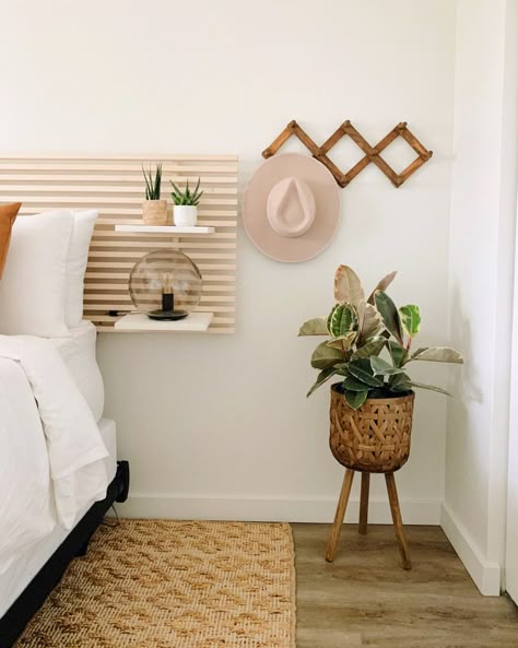 Bedroom with DIY wood slat headboard, coat hooks, and plant in corner Painted Headboard, Diy Bed Headboard, Slatted Headboard, Diy Headboards, Diy Headboard, Wood Headboard, Bedroom Headboard, Cubicle, Diy Bed