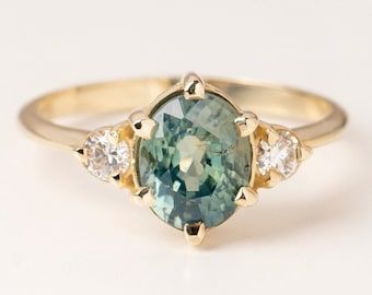 Teal Sapphire Ring, Cushion Diamond Ring, Sapphire Engagement Ring Set, Cushion Engagement Ring, Teal Sapphire, Ring Cushion, Buying An Engagement Ring, Cushion Cut Engagement Ring, Engagement Sets