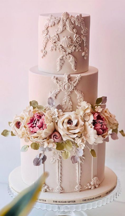 25. Vintage Wedding Cake Adorned with Delicate Sugar Flowers The “Eternal Elegance Wedding Cake” is a masterpiece that embodies the timeless beauty and grace... Wedding Cake Ideas Vintage, Cake Ideas Vintage, Cakes 2023, Victorian Wedding Cakes, Orchids And Roses, Art Deco Wedding Cake, Super Torte, Wedding Cake Art, Extravagant Wedding Cakes