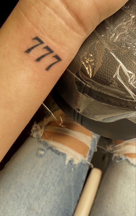 777 Tattoo On Wrist, Angel Numbers 777 Tattoo, 777 Tattoo On Hand, 777 Wrist Tattoo, Tattoo Ideas Female Angel Numbers, Tattoo Ideas 777, 777 Vibes, 777 Tattoo Men, 777 Tattoo Design