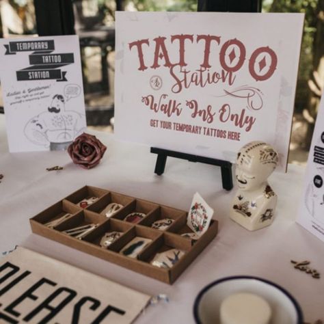 Wedding Unconventional Ideas, Fun Wedding Details Reception Ideas, Wedding Quirky Ideas, Funny Wedding Decorations, Wedding Tattoo Station Sign, Cheesy Wedding Ideas, Different Wedding Ideas Creative, Fake Tattoo Station Wedding, Wedding Ending Ideas