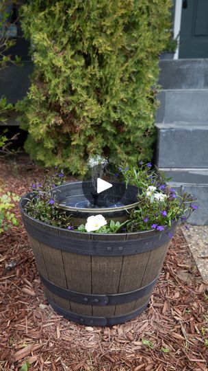 18K views · 235 reactions | I was inspired by a few of "viral solar fountain planter" posts to create my own solar fountain garden planter feature in this bare spot in our front flower bed. To make this project my own, I used unique planters from Walmart and a different way to assemble this feature, and I LOVE how it turned out. I can’t wait for you to try this DIY solar water fountain planter project!

Shop the solar fountain in CANADA: https://urlgeni.us/amazon/OutdoorCA
Shop the solar fountain in USA: https://urlgeni.us/amazon/OutdoorUS

You can also find the full tutorial by going here: https://thediymommy.com/make-an-easy-diy-solar-water-fountain-planter/

#thediymommy #gardeninspiration #diydecor #diyprojects | The DIY Mommy | The DIY Mommy · Original audio Solar Fountains Outdoor Diy, Solar Fountain Ideas, Solar Water Fountains Outdoor, Water Fountain Planter, Diy Solar Water Fountain, Front Flower Bed, Fountain Planter, Diy Solar Fountain, Unique Planters