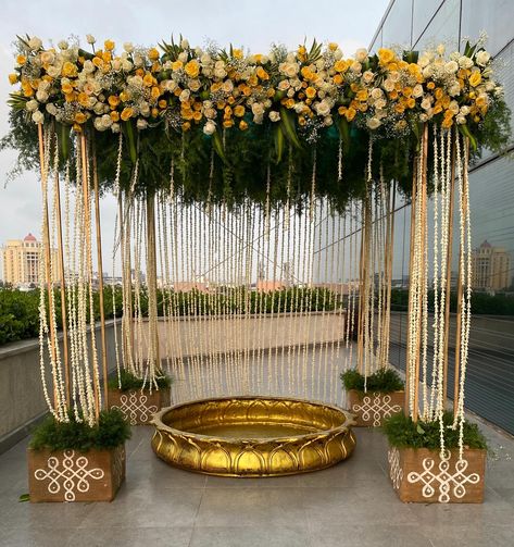 Transforming an outdoor Nalangu ceremony with stunning white and yellow floral decor, highlighted by elegant brass Urli #Humsa #Haldi #OutdoorWedding #FloralDecor #WhiteAndYellow #WeddingInspo #HumsaChennai Humsa | Haldi | Yellow | White | Floral Yellow Floral Decor, Brass Urli, Yellow Floral, Floral Decor, Wedding Inspo, Outdoor Wedding, Yellow White, Brass, Yellow