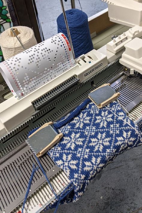 Knitting machine with blue-white snowflake pattern being produced Knitting Machine Inspiration, Machine Knitting Patterns Free, Knitting Machines For Sale, Gauge Knitting, Knitting Machine Tutorial, Standard Gauge, Knitting Machines, Knitting Machine Patterns, Knit Machine