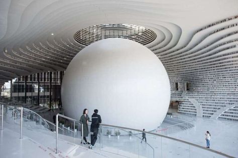 Tianjin Binhai Library atrium with giant mirrored sphere resembling an eye at the centre, opened Oct 2017, China Tianjin Binhai Library, Futuristic Library, Library Cafe, Amazing Buildings, Arch Daily, Tianjin, Barn House Plans, Architecture Firm, Backyard Design