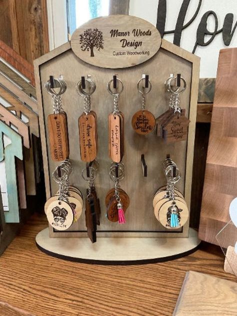 Laser cut files templates Key Ring Display, Laser Printer Projects, Keychain Display Ideas, Acrylic Laser Projects, Glowforge Projects To Sell, Keychain Stand, Laser Cut Wood Jewelry, Diy Laser Engraver, Wood Clock Design