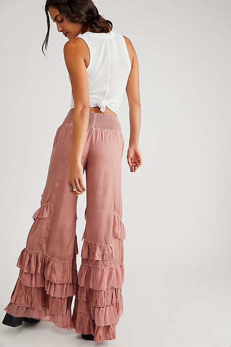 Make a statement for the frill of it in these need-now novelty pants. **Fit:** Mid-rise, billowy tiered design **Features:** Pull-on design, tiered ruffle trimming, raw-edge details, back smocked waistband feature **Why We | Rock And Frill Trousers at Free People in Burlwood, Size: Small Frill Pants, Ruffled Pants, Therapist Outfit, Ruffle Pants, How To Hem Pants, Hippie Outfits, Business Outfits, Jeans Style, Retro Inspired