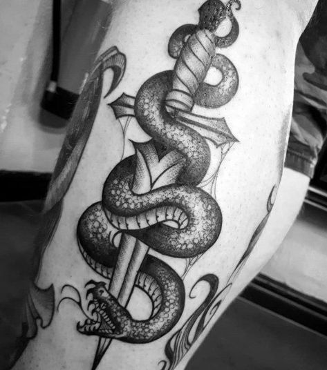 50 Snake Dagger Tattoo Ideas For Men - Sharp Serpent Designs Snake Dagger Tattoo, Dagger Tattoo Ideas, Xoil Tattoos, Snake And Dagger Tattoo, Around Arm Tattoo, Serpent Tattoo, Knife Tattoo, Art Flash, Geometric Tattoo Arm