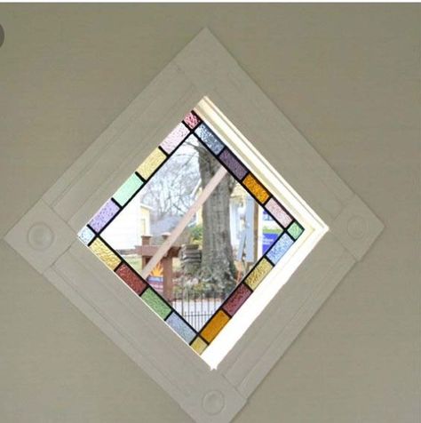 Stained glass idea for diamond shaped window Sideboard Ideas, Cabin Porches, Hall Entrada, Basement Redo, Cat Stain, Shaped Windows, Window Stained, Dining Room Windows, Sliding Shelves