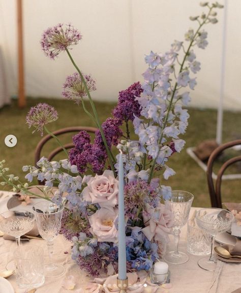 Purple Wildflower Centerpieces, Purple Floral Arrangements Wedding, Whimsical Flower Arrangements Wedding, Lilac Flower Centerpieces, White Chapel Wedding Decor, Purple And Blue Floral Arrangements, Pastel Purple And Blue Wedding, Periwinkle Wedding Decor, Blue And Purple Hydrangea Wedding