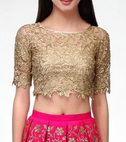 20 Beautiful Gold Colour Blouse Designs That Will Blow Your Mind Golden Blouse Design, Latest Lehenga Blouse Designs, Golden Blouse Designs, Gold Blouse Designs, Gold Crop Top, Golden Blouse, Netted Blouse Designs, Lehenga Blouse Designs, Crop Top Designs