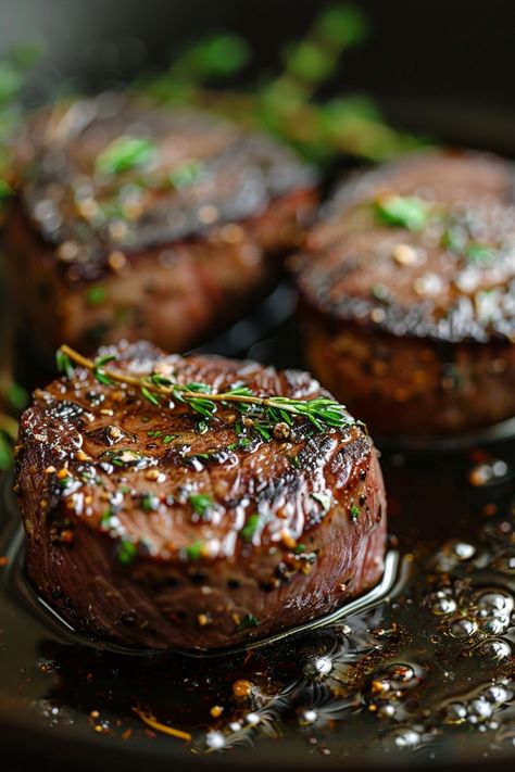 Grilled steak medallions garnished with fresh herbs. How To Cook The Perfect Filet Mignon, Filet Mignon Recipes Iron Skillet, Stovetop Filet Mignon, Filet Mignonette In Cast Iron, Cook Filet Mignon In Cast Iron, Seared Filet Mignon Cast Iron Skillet, How To Cook A Filet Mignon Stove, Best Way To Cook Filet Mignon In Oven, Filet Cast Iron Skillet