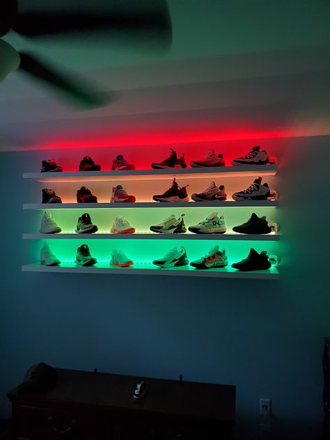 Diy floating shelves, led strips sunken in shelves with wall gromets to conceal the wires. Floating Shelves Sneakers, Led Bedroom Decor Ideas, Shoes Floating Shelves, Floating Shelves Bedroom Shoes, Sneakerhead Room Wall Shelves, Shoes On Wall Shelves, Shoes On Floating Shelves, Shoe Shelves Ideas, Shoe Shelf On Wall