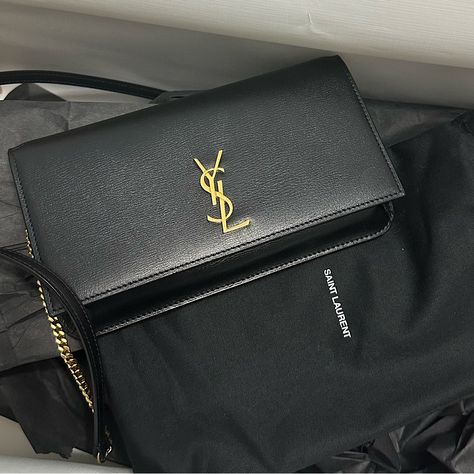 Saint Laurent Monogrammed Calf Leather Phone Holder Bag. Chain And Leather Shoulder Strap, 19.3" Drop. Can Be Worn On The Shoulder Or Across The Body. Flap Top With Ysl Logo Medallion; Snap Closure. Exterior, One Slip Pocket At Back. Interior, One Main Compartment. 100% Calf Leather. Approx. 4.3"H X 7"W X 0.9"D. Made In Italy. Dust Bag. Ysl Phone Holder Bag, Ysl Purses, Ysl Purse, Ysl Handbags, Christian Dior Handbags, Miu Miu Handbags, Givenchy Handbags, Dream Bags, Ysl Logo