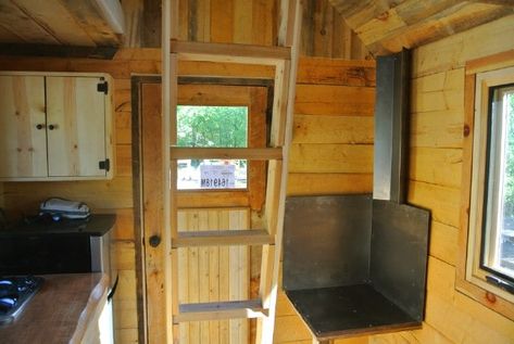 This Rustic Tiny Dream Cabin Fits on a 8x12 Single Axle Trailer - If you have ever dreamed of having your own tiny rustic cabin that you can take with you wherever you go, then you'll fall in love with “The Stanley,” an amazing rustic tiny house designed by Rocky Mountain Tiny Houses. Log Cabin Tiny House, Cabin Fits, Tiny Rustic Cabin, Tiny Log Cabins, Tiny Log Cabin, Rustic Tiny House, Tiny House Swoon, Log Cabin Interior, Dream Cabin